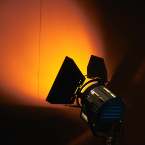 Impact storytelling consulting featured image of a spotlight conveying the concept.